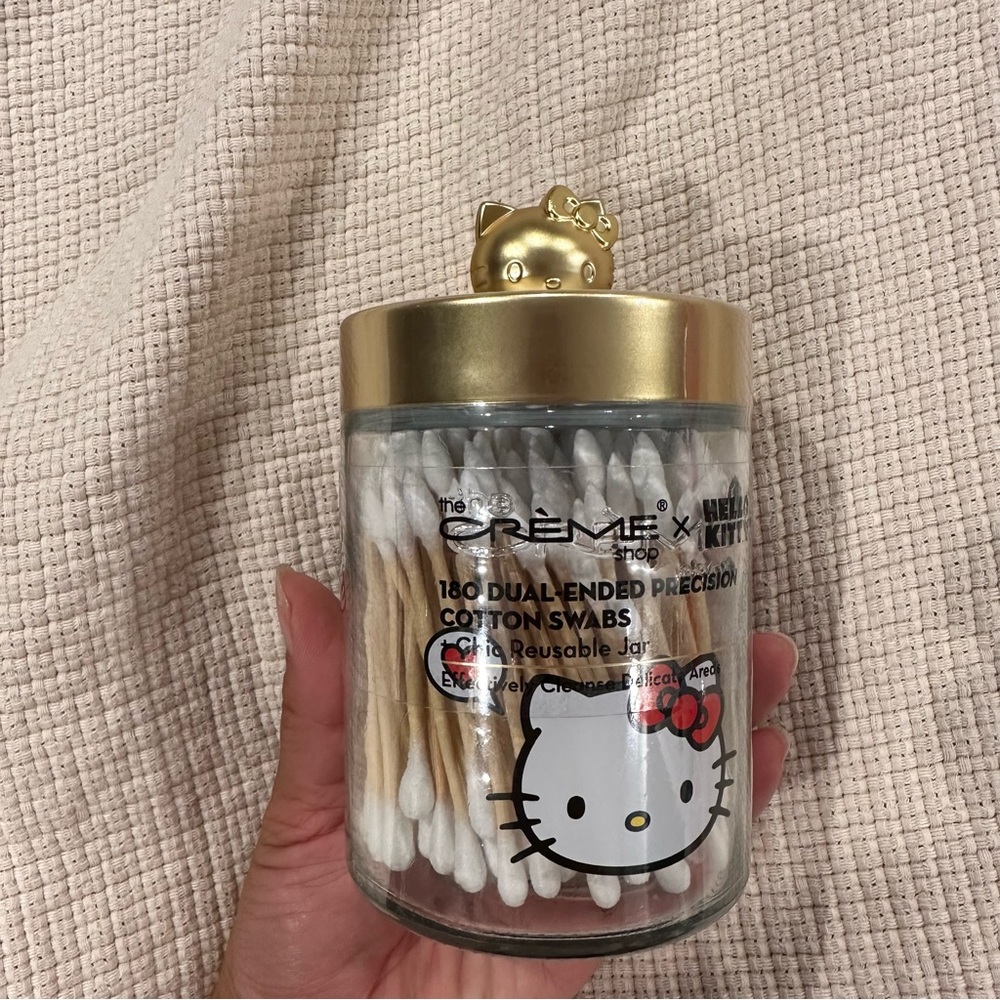 The crème shop x hello kitty cotton swab container glass